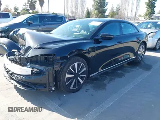 2024 Lucid Air Pure with VIN 50EA1PGA8RA003420, listed as a IAAI auction lot 41593215 with 3,856 mi miles. Bid and sale history available at carsss.com. Image 2.