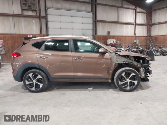 2017 Hyundai Tucson Sport with VIN KM8J3CA29HU418926, listed as a IAAI auction lot 41842649 with 73,605 mi miles and . Bid and sale history available at DreamBid. Image 14.