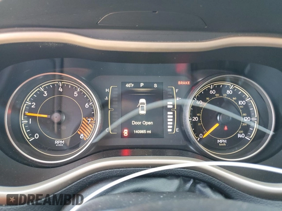 2015 Jeep Cherokee Latitude with VIN 1C4PJLCS0FW707387, listed as a Copart auction lot 48953465 with 140,965 mi miles and Salvage Title. Bid and sale history available at carsss.com. Image 9.