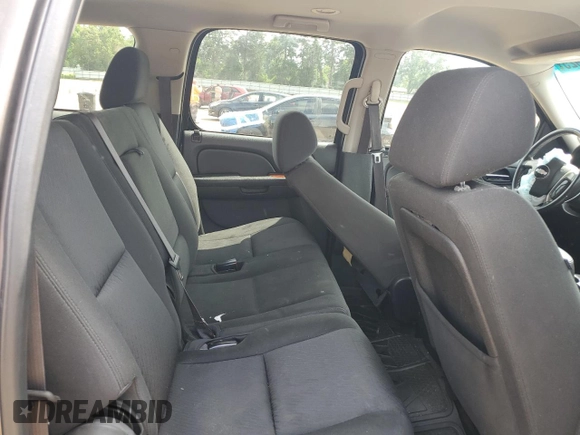 2013 Chevrolet Suburban LS z VIN 1GNSCHE00DR221307, wystawiony jako Copart lot #54684925 z przebiegiem 203 169 mil mil oraz Szkoda całkowita • Salvage title. Historia ofert i sprzedaży dostępna na DreamBid. Obrazek 11.