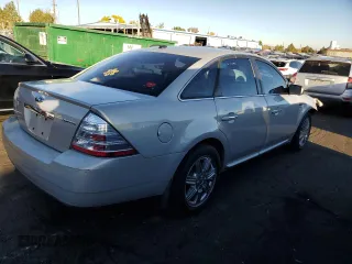 2009 Ford Taurus Limited with VIN 1FAHP25W89G101188, listed as a Copart auction lot 77220984 with 149,142 mi miles and Salvage Title. Bid and sale history available at carsss.com. Image 3.