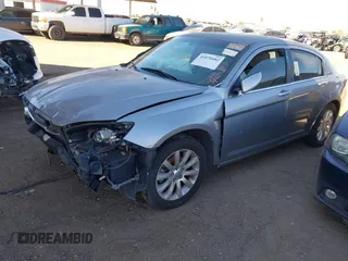 2013 Chrysler 200 Touring with VIN 1C3CCBBB3DN672274, listed as a IAAI auction lot 41870482 with 148,887 mi miles. Bid and sale history available at carsss.com. Image 2.