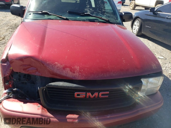 2001 GMC Sonoma SLS 1SG z VIN 1GTCS19W918225024, wystawiony jako Copart lot #49043895 z przebiegiem 140 616 mil mil oraz Szkody całkowita. Historia ofert i sprzedaży dostępna na DreamBid. Obrazek 11.