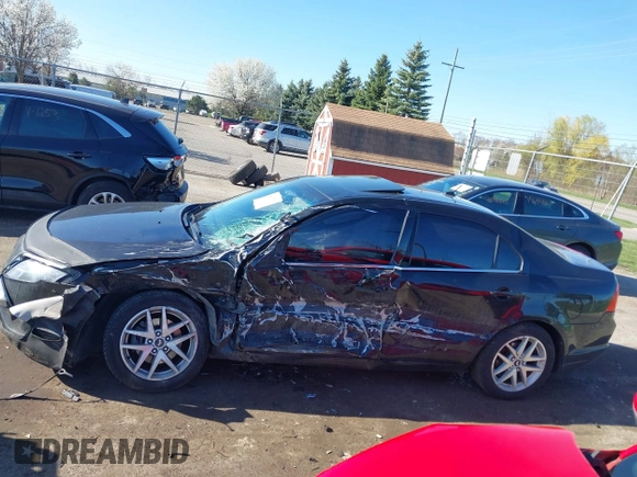 2012 Ford Fusion SEL z VIN 3FAHP0JG2CR338469, wystawiony jako IAAI lot #42095378 z przebiegiem 180 762 mil mil oraz . Historia ofert i sprzedaży dostępna na DreamBid. Obrazek 14.