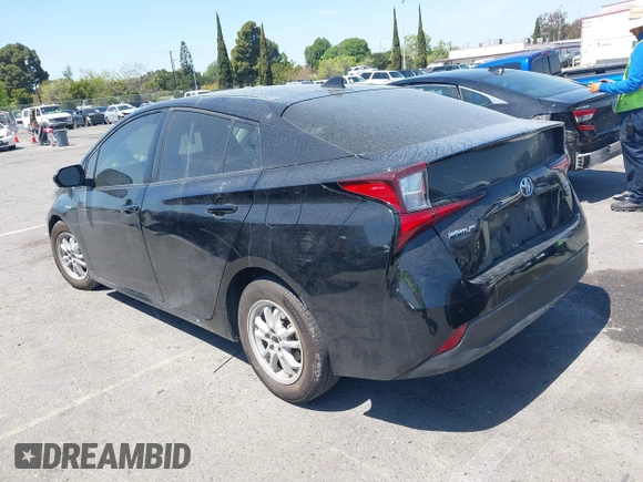 2019 Toyota Prius L Eco with VIN JTDKARFU0K3087064, listed as a IAAI auction lot 41986365 with 81,735 mi miles. Bid and sale history available at carsss.com. Image 3.