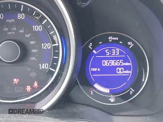 2020 Honda Fit LX z VIN 3HGGK5H40LM717305, wystawiony jako IAAI lot #42093169 z przebiegiem 69 665 mil mil oraz . Historia ofert i sprzedaży dostępna na DreamBid. Obrazek 15.