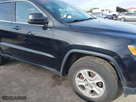 2014 Jeep Grand Cherokee Laredo with VIN 1C4RJFAG9EC516138, listed as a IAAI auction lot 42055214 with 135,701 mi miles. Bid and sale history available at carsss.com. Image 6.