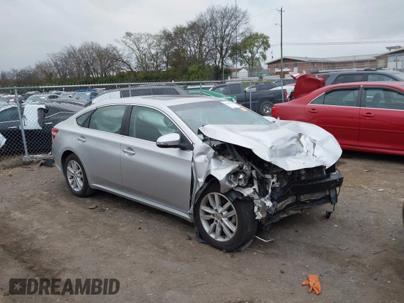 2014 Toyota Avalon Limited with VIN 4T1BK1EB8EU133085, listed as a IAAI auction lot 40949898 with 126,697 mi miles. Bid and sale history available at carsss.com. Image 1.