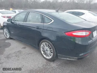2014 Ford Fusion SE Hybrid with VIN 3FA6P0LU7ER282848, listed as a IAAI auction lot 41560449 with 180,696 mi miles. Bid and sale history available at carsss.com. Image 3.