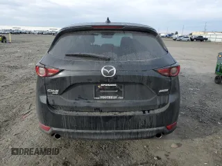 2019 Mazda CX-5 Grand Touring with VIN JM3KFBDM9K1650840, listed as a Copart auction lot 41929185 with 61,814 mi miles and Salvage Title. Bid and sale history available at carsss.com. Image 6.