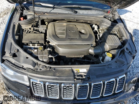 2018 Jeep Grand Cherokee Laredo E with VIN 1C4RJEAGXJC246874, listed as a Copart auction lot 56722005 with 101,493 mi miles and Salvage title. Bid and sale history available at DreamBid. Image 12.