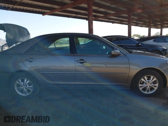 2006 Toyota Camry LE z VIN 4T1BF32K86U635925, wystawiony jako IAAI lot #42267547 z przebiegiem 162 593 mil mil oraz . Historia ofert i sprzedaży dostępna na DreamBid. Obrazek 13.