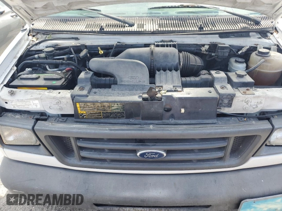 2004 Ford Econoline Cargo with VIN 1FTRE14W94HA79656, listed as a Copart auction lot 75132854 with 202,889 mi miles and Salvage Title. Bid and sale history available at carsss.com. Image 12.