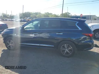 2020 Infiniti QX60 LUXE with VIN 5N1DL0MMXLC526804, listed as a IAAI auction lot 41847277 with 131,121 mi miles. Bid and sale history available at carsss.com. Image 14.