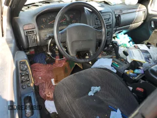 2000 Jeep Grand Cherokee Laredo with VIN 1J4G248S7YC321298, listed as a Copart auction lot 58036255 with 292,779 mi miles and Salvage title. Bid and sale history available at DreamBid. Image 8.