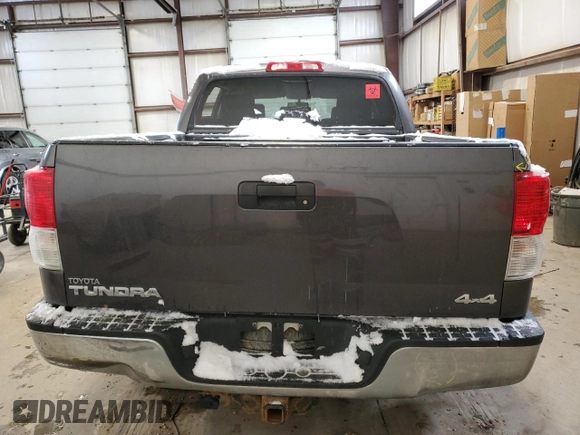 2013 Toyota Tundra z VIN 5TFDY5F18DX271506, wystawiony jako Copart lot #82296664 z przebiegiem Nie podano mil oraz Szkoda całkowita • Salvage title. Historia ofert i sprzedaży dostępna na DreamBid. Obrazek 6.