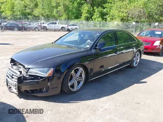 2013 Audi A8 3.0L with VIN WAURGAFD0DN005532, listed as a IAAI auction lot 42113540 with 176,635 mi miles and . Bid and sale history available at DreamBid. Image 2.