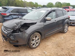 2015 Ford Escape Titanium with VIN 1FMCU9J90FUC14650, listed as a IAAI auction lot 41992858 with 158,963 mi miles and . Bid and sale history available at DreamBid. Image 17.