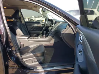 2015 Infiniti Q50 Premium with VIN JN1BV7AP1FM342558, listed as a IAAI auction lot 41975803 with 140,603 mi miles. Bid and sale history available at carsss.com. Image 5.
