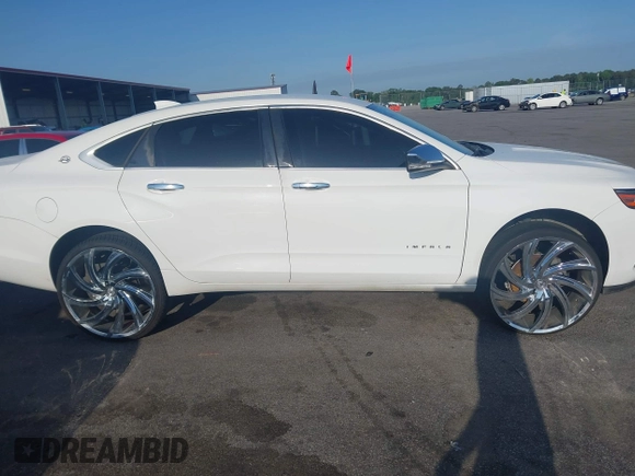 2015 Chevrolet Impala LT with VIN 2G1115SL9F9211016, listed as a IAAI auction lot 42109483 with 215,989 mi miles and . Bid and sale history available at DreamBid. Image 13.