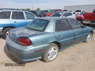 1996 Pontiac Grand Am SE with VIN 1G2NE52M8TC810732, listed as a IAAI auction lot 42338979 with 107,027 mi miles and . Bid and sale history available at DreamBid. Image 4.