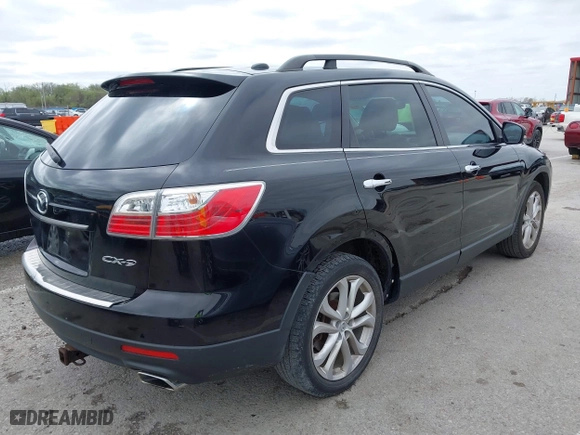 2011 Mazda CX-9 Grand Touring with VIN JM3TB2DAXB0300466, listed as a IAAI auction lot 41921411 with 196,257 mi miles. Bid and sale history available at carsss.com. Image 4.