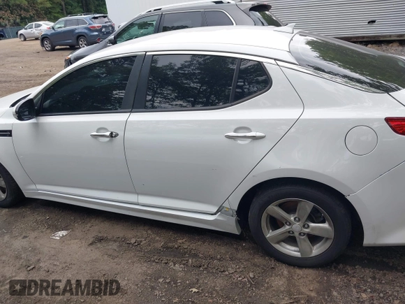 2015 Kia Optima LX with VIN KNAGM4A7XF5599309, listed as a IAAI auction lot 42493215 with 143,703 mi miles and . Bid and sale history available at DreamBid. Image 6.