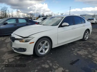 2013 BMW 3 Series 320i xDrive with VIN WBA3C3C54DF981883, listed as a Copart auction lot 47380385 with 191,534 mi miles and Salvage title. Bid and sale history available at DreamBid. Image 1.