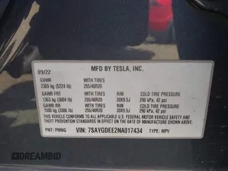 2022 Tesla Model Y Long Range with VIN 7SAYGDEE2NA017434, listed as a IAAI auction lot 41842025 with 35,164 mi miles and . Bid and sale history available at DreamBid. Image 9.