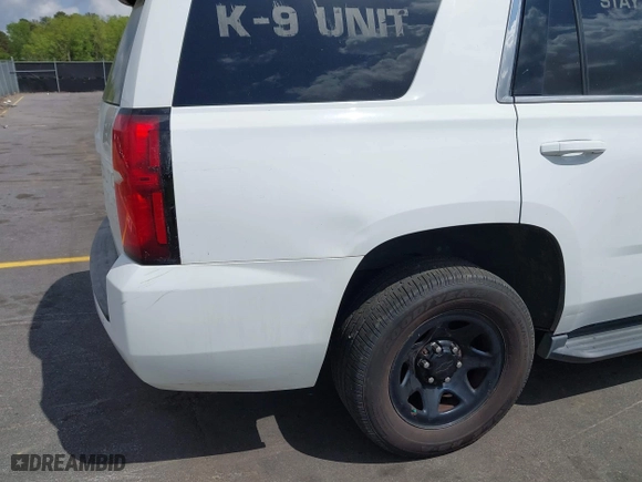 2016 Chevrolet Tahoe Commercial with VIN 1GNLCDEC5GR423300, listed as a IAAI auction lot 41967399 with 147,429 mi miles. Bid and sale history available at carsss.com. Image 18.
