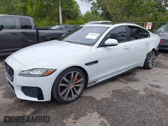 2018 Jaguar XF with VIN SAJBG4FV9JCY55697, listed as a IAAI auction lot 41406469 with 55,572 mi miles and . Bid and sale history available at DreamBid. Image 18.