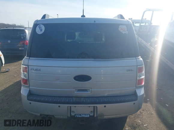 2011 Ford Flex SEL z VIN 2FMGK5CC2BBD21448, wystawiony jako IAAI lot #41814326 z przebiegiem 153 700 mil mil oraz . Historia ofert i sprzedaży dostępna na DreamBid. Obrazek 16.
