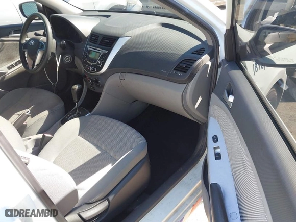 2012 Hyundai Accent GS with VIN KMHCT5AEXCU051493, listed as a IAAI auction lot 41666634 with 176,293 mi miles. Bid and sale history available at carsss.com. Image 5.