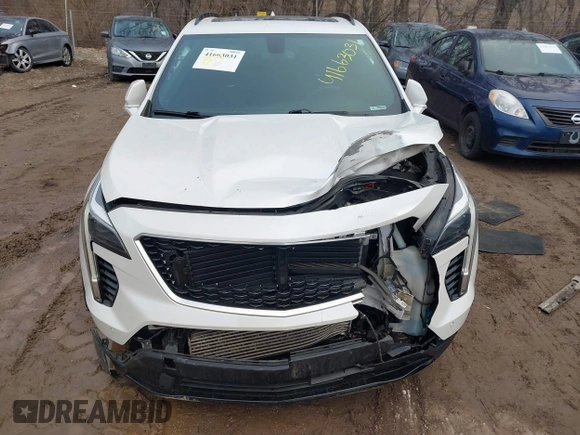 2019 Cadillac XT4 AWD Sport with VIN 1GYFZFR44KF146971, listed as a IAAI auction lot 41663031 with 129,248 mi miles and . Bid and sale history available at DreamBid. Image 6.