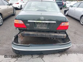 2002 Acura RL with VIN JH4KA96542C005442, listed as a IAAI auction lot 41951402 with 211,734 mi miles. Bid and sale history available at carsss.com. Image 12.