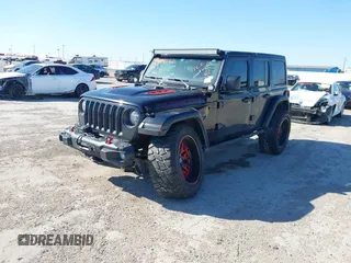 2018 Jeep Wrangler Unlimited Rubicon z VIN 1C4HJXFGXJW108766, wystawiony jako IAAI lot #41846062 z przebiegiem 96 791 mil mil oraz . Historia ofert i sprzedaży dostępna na DreamBid. Obrazek 18.
