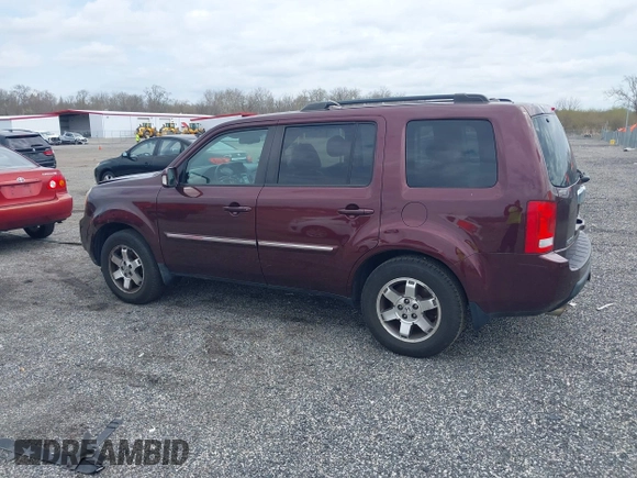 2010 Honda Pilot Touring with VIN 5FNYF4H95AB040721, listed as a IAAI auction lot 41928412 with 213,219 mi miles and . Bid and sale history available at carsss.com. Image 14.