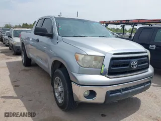 2012 Toyota Tundra 2WD Truck with VIN 5TFRM5F15CX039879, listed as a IAAI auction lot 41886233 with 238,214 mi miles. Bid and sale history available at carsss.com. Image 1.