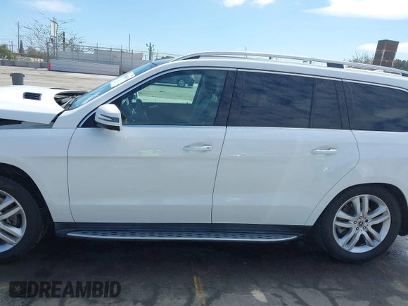 2018 Mercedes-Benz GLS 450 with VIN 4JGDF6EE9JB049030, listed as a IAAI auction lot 41804243 with 60,985 mi miles and . Bid and sale history available at DreamBid. Image 15.