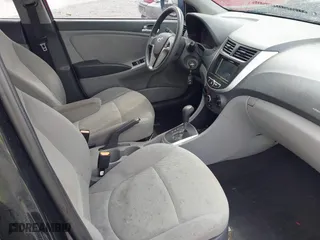 2014 Hyundai Accent GS with VIN KMHCT5AE7EU164658, listed as a IAAI auction lot 41911092 with 132,442 mi miles. Bid and sale history available at carsss.com. Image 5.