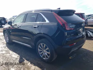2021 Cadillac XT4 AWD Premium Luxury with VIN 1GYFZDR41MF002835, listed as a Copart auction lot 49384424 with 9,984 mi miles and Salvage Title. Bid and sale history available at carsss.com. Image 2.