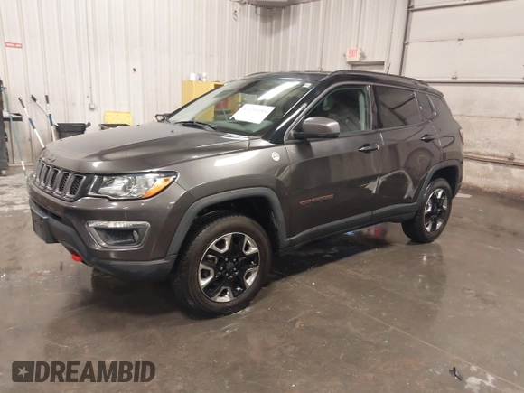 2018 Jeep Compass Trailhawk with VIN 3C4NJDDB4JT210451, listed as a IAAI auction lot 41239258 with 90,552 mi miles and . Bid and sale history available at carsss.com. Image 17.