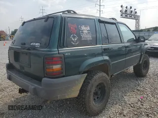 1997 Jeep Grand Cherokee Laredo with VIN 1J4GZ58SXVC595012, listed as a Copart auction lot 59746655 with Not provided miles and Salvage title. Bid and sale history available at DreamBid. Image 3.