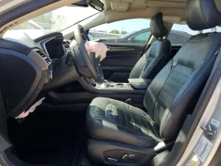 2017 Ford Fusion SE z VIN 3FA6P0HD7HR184691, wystawiony jako Copart lot #52515085 z przebiegiem 113 275 mil mil oraz Szkoda całkowita • Salvage title. Historia ofert i sprzedaży dostępna na DreamBid. Obrazek 7.