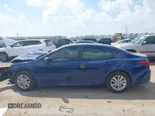 2025 Toyota Camry LE with VIN 4T1DAACK0SU091506, listed as a IAAI auction lot 41880460 with 8,407 mi miles and . Bid and sale history available at DreamBid. Image 14.