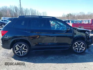 2023 Honda Passport Elite with VIN 5FNYF8H04PB006514, listed as a IAAI auction lot 41537826 with 14,640 mi miles and . Bid and sale history available at DreamBid. Image 14.