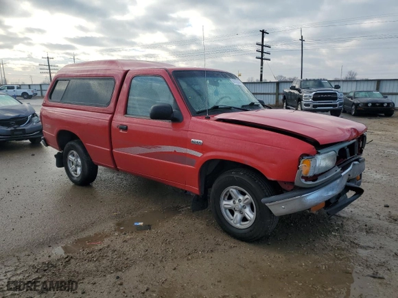 1997 Mazda B-Series 2WD Truck with VIN 4F4CR12AXVTM12907, listed as a Copart auction lot 86103344 with 241,029 mi miles and Salvage Title. Bid and sale history available at carsss.com. Image 4.