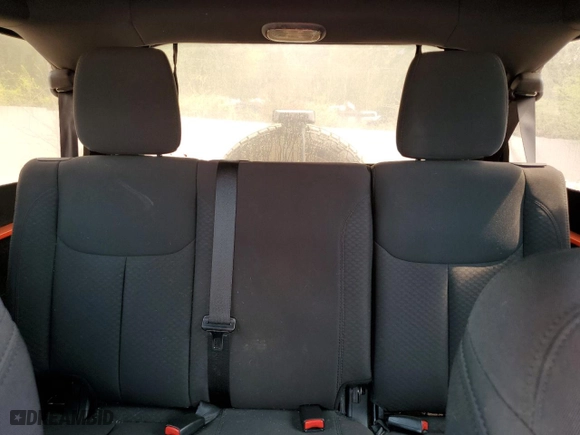 2015 Jeep Wrangler Unlimited Sport with VIN 1C4HJWDGXFL726174, listed as a Copart auction lot 51895295 with 107,377 mi miles and Salvage Title. Bid and sale history available at carsss.com. Image 10.