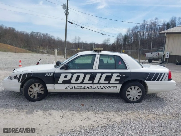 2009 Ford Police Interceptor with VIN 2FAHP71V99X117825, listed as a IAAI auction lot 41803538 with 140,903 mi miles. Bid and sale history available at carsss.com. Image 14.