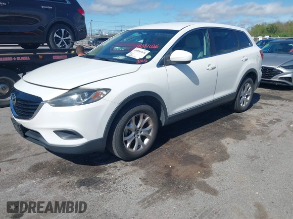 2015 Mazda CX-9 Sport with VIN JM3TB2BV3F0455632, listed as a IAAI auction lot 41881026 with 102,201 mi miles and . Bid and sale history available at carsss.com. Image 2.